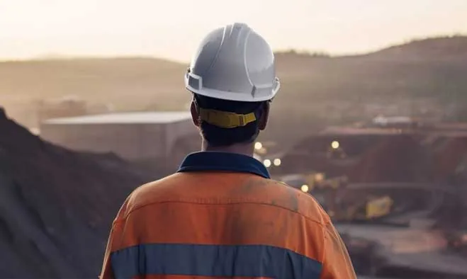 Engineer overlooking mine site